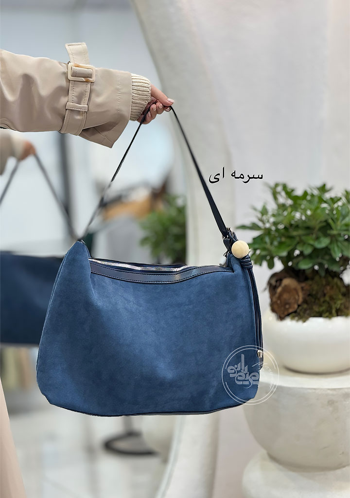 کیف-گوی-دار-سرمه-ای کیف-گوی-دار-سرمه-ای